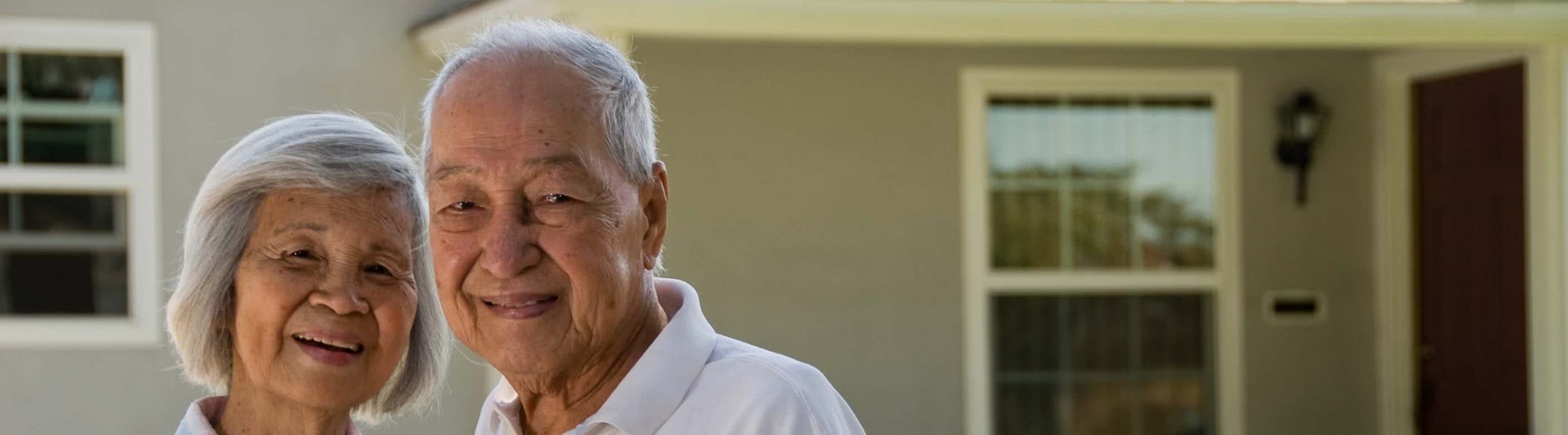 Elderly asian couple smiling